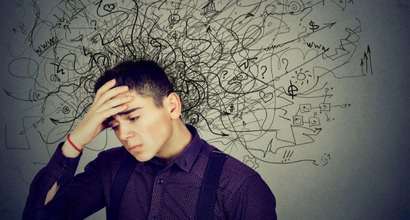 Young professional feeling anxious with chaotic thoughts, symbolizing work anxiety in IT hubs like Hinjewadi Pune.